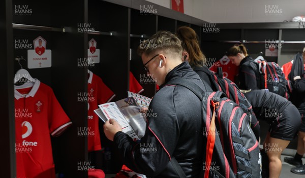 300324 - England v Wales, Guinness Women’s 6 Nations - Donna Rose of Wales reads the match programme in the changing room