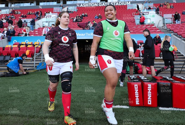 300324 - England v Wales, Guinness Women’s 6 Nations - Bethan Lewis of Wales and Sisilia Tuipulotu of Wales come out for warm up