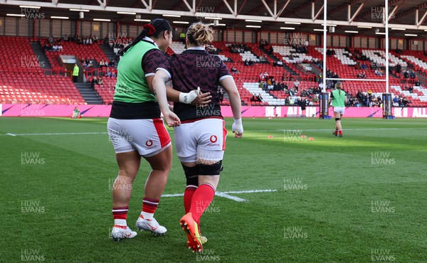 300324 - England v Wales, Guinness Women’s 6 Nations - Bethan Lewis of Wales and Sisilia Tuipulotu of Wales come out for warm up