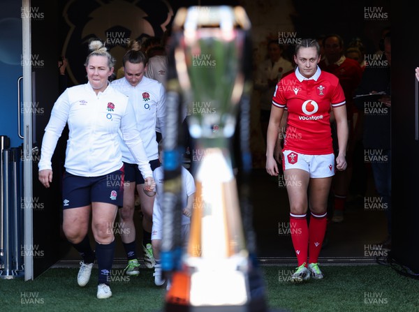 300324 - England v Wales, Guinness Women’s 6 Nations - Marlie Packer of England and Hannah Jones of Wales lead their team out at the start of the match