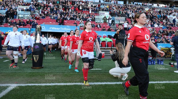 300324 - England v Wales, Guinness Women’s 6 Nations - Alisha Butchers of Wales and Bethan Lewis of Wales walk out at the start of the match