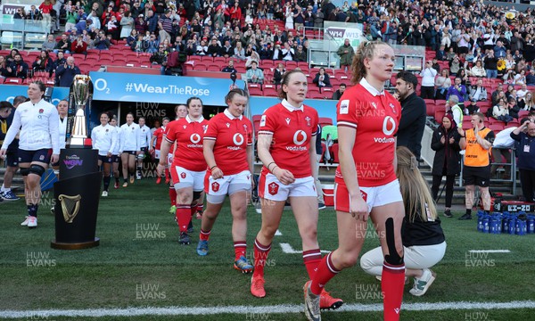 300324 - England v Wales, Guinness Women’s 6 Nations - Carys Cox of Wales, Jenny Hesketh of Wales and Lleucu George of Wales walk out at the start of the match