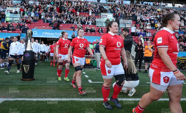 300324 - England v Wales, Guinness Women’s 6 Nations - Abbey Constable of Wales, Kate Williams of Wales and Abbie Fleming of Wales walk out at the start of the match