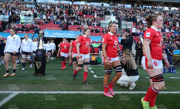 300324 - England v Wales, Guinness Women’s 6 Nations - Abbie Fleming of Wales, Georgia Evans of Wales and Natalia John of Wales walk out at the start of the match