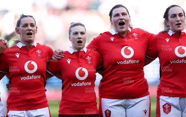 300324 - England v Wales, Guinness Women’s 6 Nations - Kerin Lake of Wales, Keira Bevan of Wales, Gwenllian Pyrs of Wales and Courtney Keight of Wales during the anthem