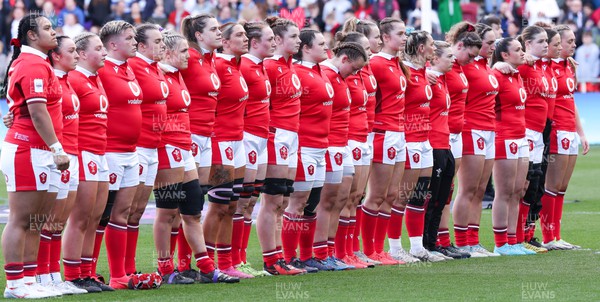 300324 - England v Wales, Guinness Women’s 6 Nations - Carys Phillips of Wales, Alex Callender of Wales and Natalia John of Wales during the anthem