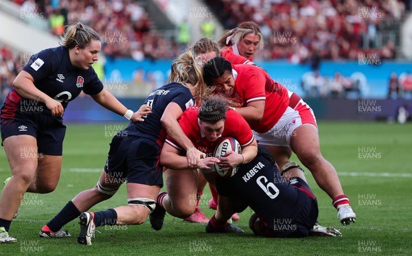 300324 - England v Wales, Guinness Women’s 6 Nations - Gwenllian Pyrs of Wales is tackled as she drives for the line