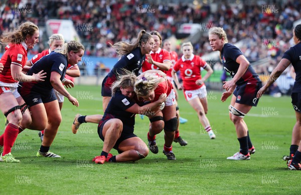 300324 - England v Wales, Guinness Women’s 6 Nations - Alex Callender of Wales is held as she drives for the line