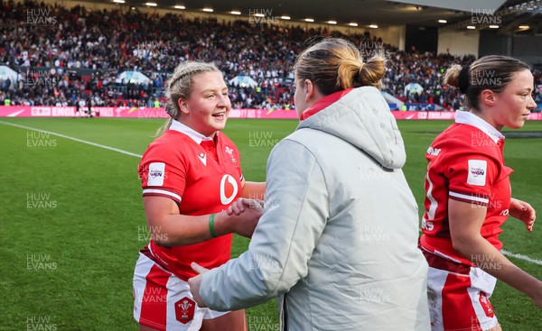 300324 - England v Wales, Guinness Women’s 6 Nations - Molly Reardon of Wales is congratulated on her first cap by Bethan Lewis of Wales