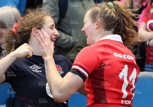 300324 - England v Wales, Guinness Women’s 6 Nations - Abby Dow of England and Carys Cox of Wales share a joke at the end of the match