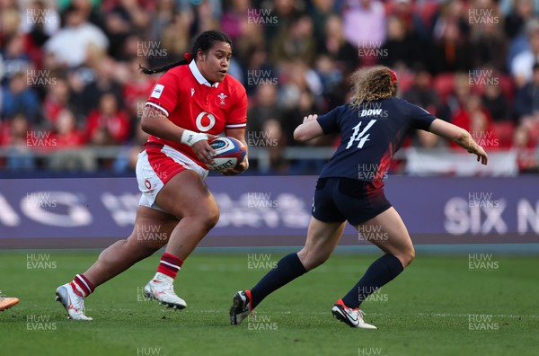 300324 - England v Wales, Guinness Women’s 6 Nations - Sisilia Tuipulotu of Wales takes on Abby Dow of England
