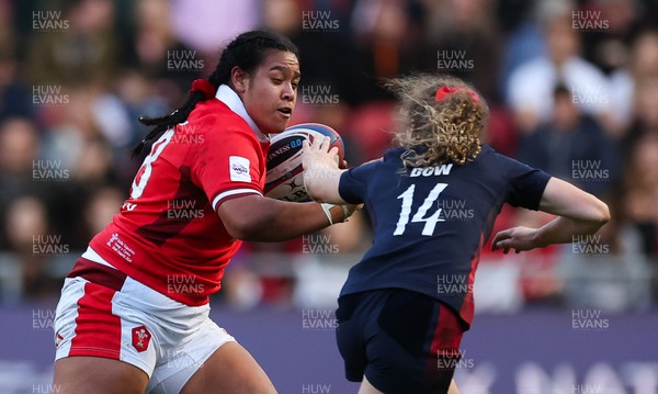 300324 - England v Wales, Guinness Women’s 6 Nations - Sisilia Tuipulotu of Wales takes on Abby Dow of England