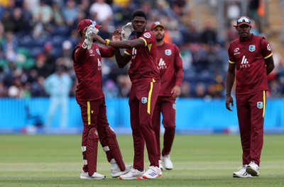010625 - England v West Indies - 2nd ODI at Sophia Gardens - Alzarri Joseph of West Indies celebrates taking the wicket of Jos Buttler of England