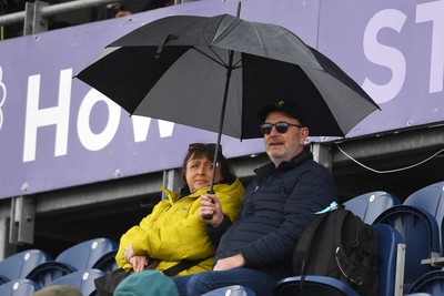 160526 - England Women v New Zealand Women - Metro Bank One Day International - Fans with umbrellas as the rain starts to come in 