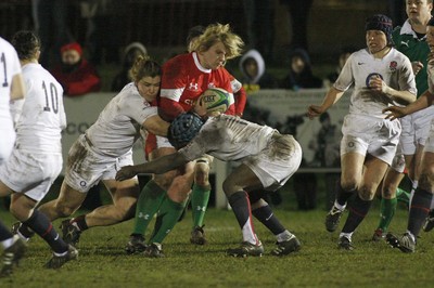 06.02.10 England v Wales - Women's - 6 Nations -  Wales' Catrin Edwards is tackled by England's Catherine Spencer(L) & Margaret Alphonsi. 