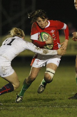 06.02.10 England v Wales - Women's - 6 Nations -  Wales' Ceri Redman is tackled by England's Fiona Peacock. 