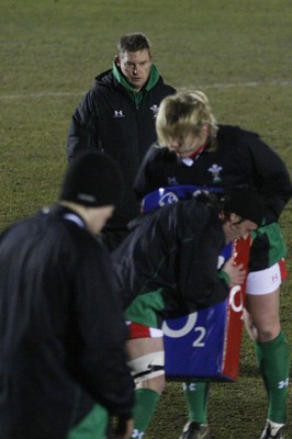 06.02.10 England v Wales - Women's - 6 Nations -  Wales coach Jason Lewis oversees his team warm up. 