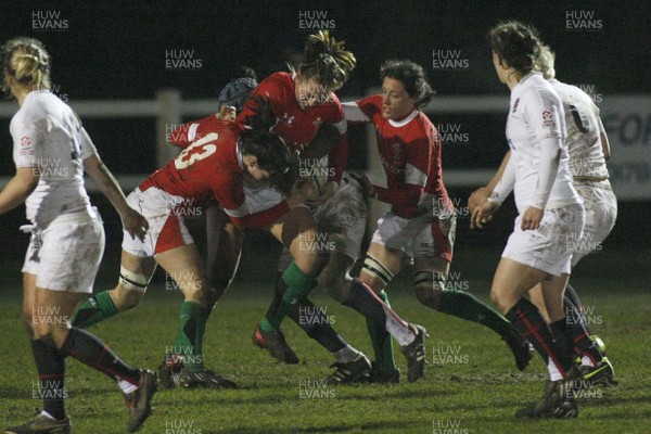 06.02.10 England v Wales - Women's - 6 Nations -  Wales' Clare Flowers is tackled by England's Margaret Alphonsi. 