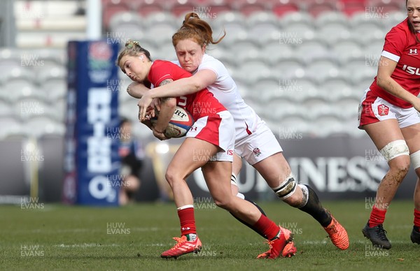 070320 - England Women v Wales Women - 6 Nations Championship - Keira Bevan of Wales is tackled by Harriet Millar-Mills of England