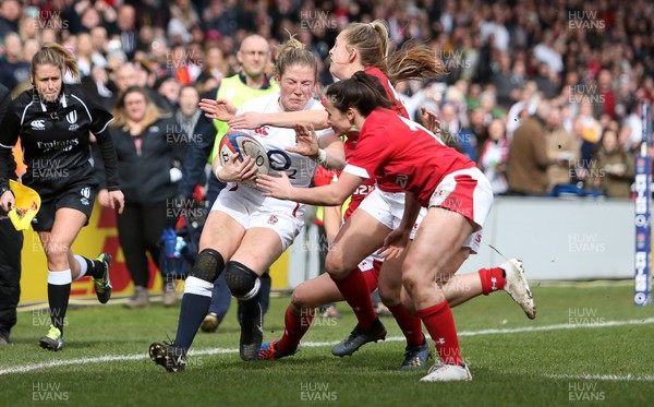 070320 - England Women v Wales Women - 6 Nations Championship - Lydia Thompson of England is tackled by Hannah Jones and Kayleigh Powell of Wales