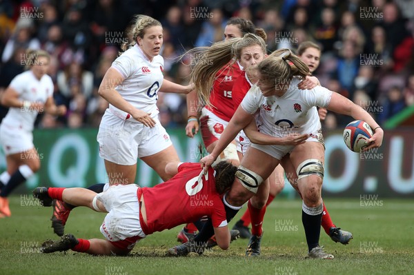 070320 - England Women v Wales Women - 6 Nations Championship - Poppy Cleall of England is tackled by Alisha Butchers and Hannah Jones of Wales