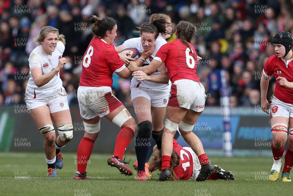 070320 - England Women v Wales Women - 6 Nations Championship - Emily Scarratt of England is tackled by Siwan Lillicrap and Alisha Butchers of Wales