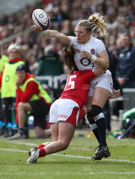070320 - England v Wales, Women's Six Nations 2020 - Lydia Thompson of England offloads as she is tackled by Kayleigh Powell of Wales
