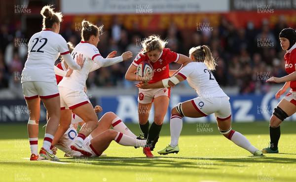 090422 - England Women v Wales Women - TikTok Womens Six Nations - Hannah Jones of Wales is tackled by Vicky Fleetwood of England