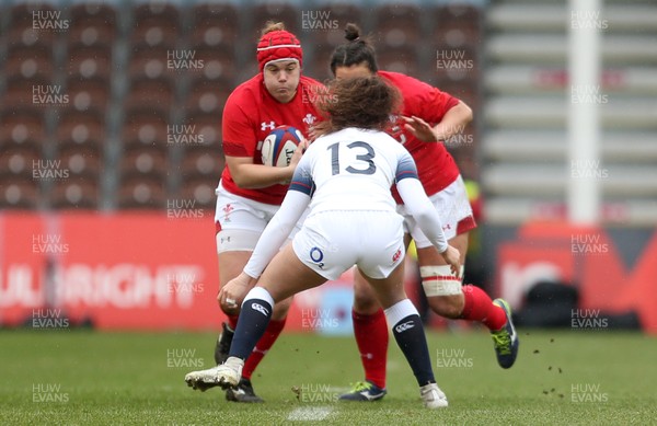 100218 - England Women v Wales Women - Natwest 6 Nations - Carys Phillips of Wales is tackled by Ellie Kildunne of England