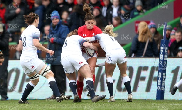 100218 - England Women v Wales Women - Natwest 6 Nations - Jess Kavanagh-Williams of Wales is tackled by Sarah Bern and Rachael Burford of England