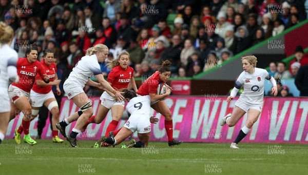 100218 - England Women v Wales Women - Natwest 6 Nations - Jess Kavanagh-Williams of Wales is tackled by Leanne Riley of England