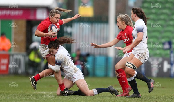 100218 - England Women v Wales Women - Natwest 6 Nations - Hannah Bluck of Wales is tackled by Charlotte Pearce of England
