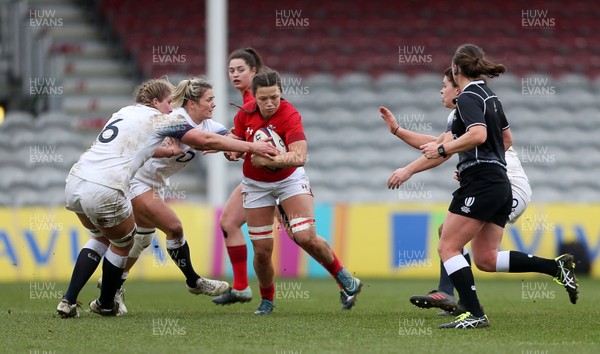 100218 - England Women v Wales Women - Natwest 6 Nations - Alisha Butchers of Wales is tackled by Poppy Cleall of England