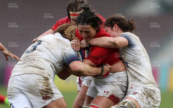 100218 - England Women v Wales Women - Natwest 6 Nations - Siwan Lillicrap of Wales is tackled by Sarah Bern and Katy McLean of England