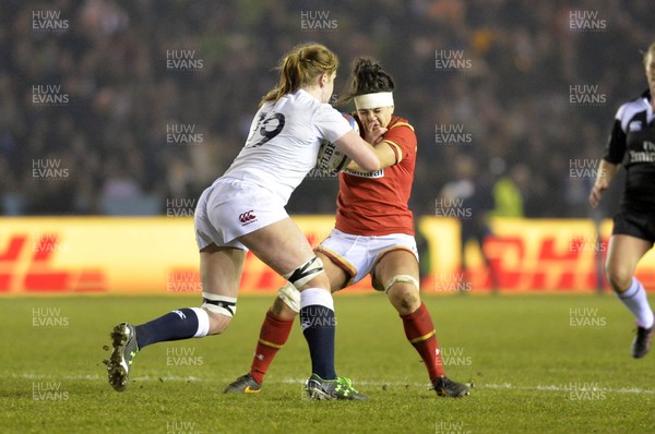 120316 England v Wales Women Sian Williams of Wales gets handed of by Harriet Millar-Mills of England