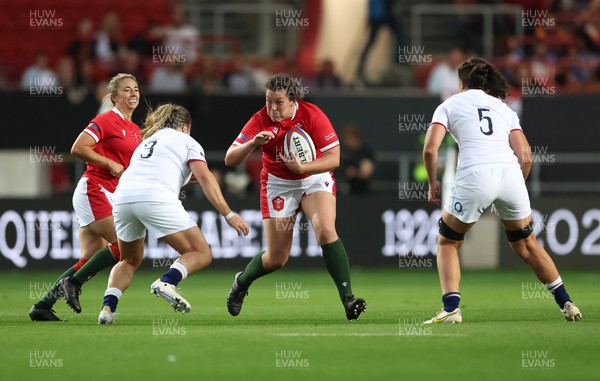 140922 - England Women v Wales Women, Women’s Rugby World Cup Warm-up Match - Cerys Hale of Wales takes on Sarah Bern of England and Abbie Ward of England