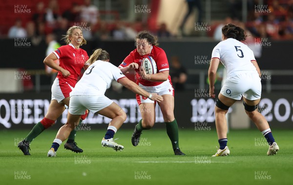 140922 - England Women v Wales Women, Women’s Rugby World Cup Warm-up Match - Cerys Hale of Wales takes on Sarah Bern of England and Abbie Ward of England