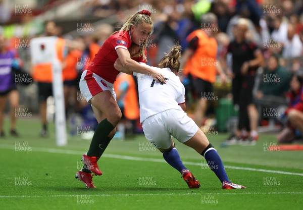 140922 - England Women v Wales Women, Women’s Rugby World Cup Warm-up Match - Hannah Jones of Wales tackles Lydia Thompson of England
