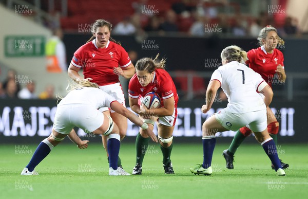 140922 - England Women v Wales Women, Women’s Rugby World Cup Warm-up Match - Natalia John of Wales takes on Alex Matthews of England