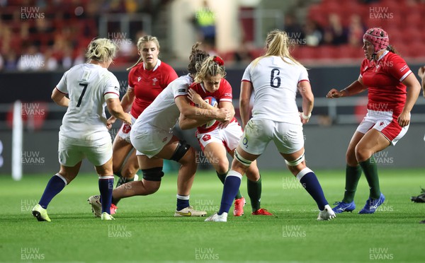 140922 - England Women v Wales Women, Women’s Rugby World Cup Warm-up Match - Hannah Jones of Wales is tackled