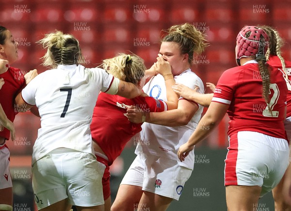 140922 - England Women v Wales Women, Women’s Rugby World Cup Warm-up Match - Alex Callender of Wales and Sarah Bern of England come to blows