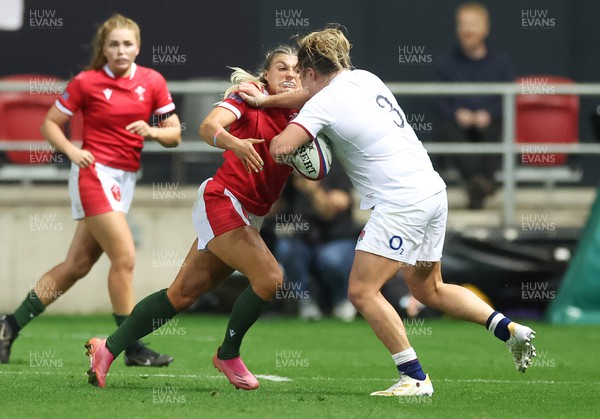 140922 - England Women v Wales Women, Women’s Rugby World Cup Warm-up Match - Lowri Norkett of Wales tackles Sarah Bern of England