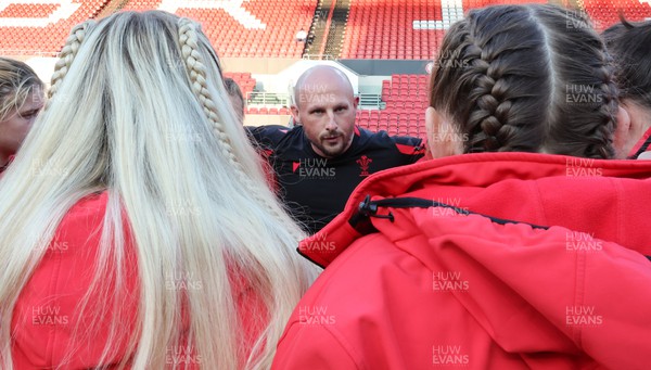 140922 - England Women v Wales Women, Women’s Rugby World Cup Warm-up Match - Richard Whiffin speaks to the players as the Wales Women squad huddle up ahead of the match