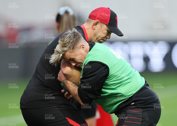 140922 - England Women v Wales Women, Women’s Rugby World Cup Warm-up Match - Wales head coach Ioan Cunningham and Donna Rose of Wales during warm up