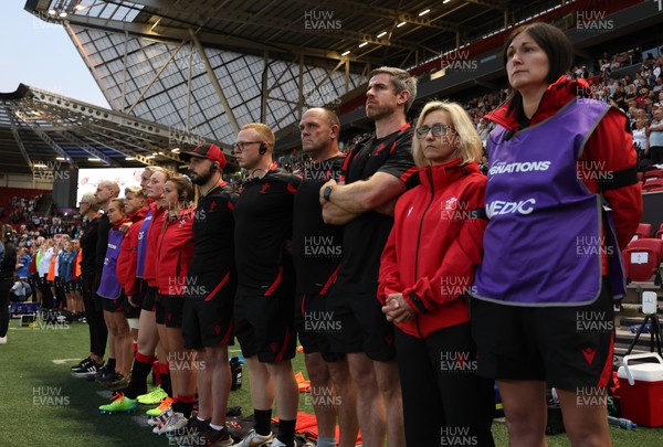 140922 - England Women v Wales Women, Women’s Rugby World Cup Warm-up Match - The Wales management team line up for the anthems and a minutes silence in memory of HM The Queen