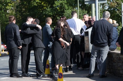 280918 - Enzo Calzaghe Funeral, Newbridge, South Wales - Mourners gather outside the church for the funeral of boxing trainer Enzo Calzaghe