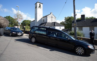 280918 - Enzo Calzaghe Funeral, Newbridge, South Wales - The hearse arrives the church for the funeral of boxing trainer Enzo Calzaghe