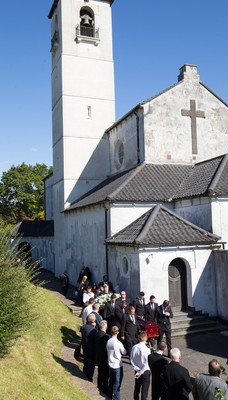 280918 - Enzo Calzaghe Funeral, Newbridge, South Wales - Former World Champion boxer Joe Calzaghe, right, leads the coffin out of the church at the funeral of his father and boxing trainer Enzo Calzaghe