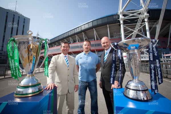 170713 - ERC 2014 Finals Announcement, Millennium Stadium, Cardiff -The announcement that the ERC 2014 Finals will be staged in Cardiff Pictured with the Heineken Cup and the Amlin Challenge Cup at the Millennium Stadium are, left to right, Roger Lewis, WRU Group Chief Executive, Gethin Jenkins of the Cardiff Blues a previous winner of both trophies and Derek McGrath, ERC Chief ExecutivePicture issued for free editorial use by the ERC by Huw Evans Agency, Cardiff