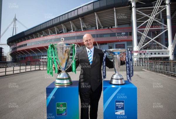 170713 - ERC 2014 Finals Announcement, Millennium Stadium, Cardiff -The announcement that the ERC 2014 Finals will be staged in Cardiff Pictured with the Heineken Cup and the Amlin Challenge Cup at the Millennium Stadium is Derek McGrath, ERC Chief ExecutivePicture issued for free editorial use by the ERC by Huw Evans Agency, Cardiff